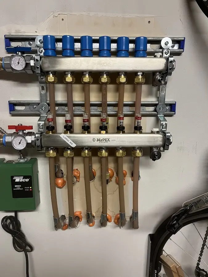 Plumber performing Water Heater Repair at a residential property in Summit Park